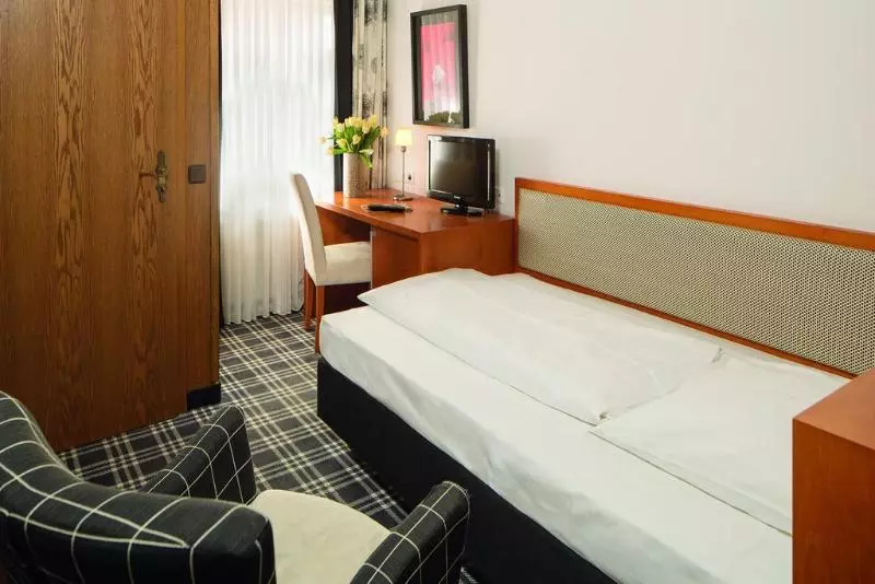 Отель Am Schlosspark Garni