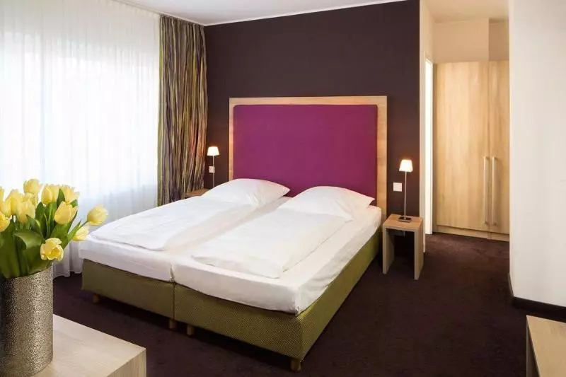 Отель Am Schlosspark Garni