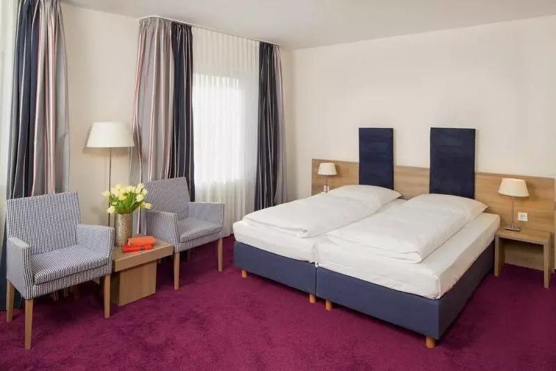 Отель Am Schlosspark Garni