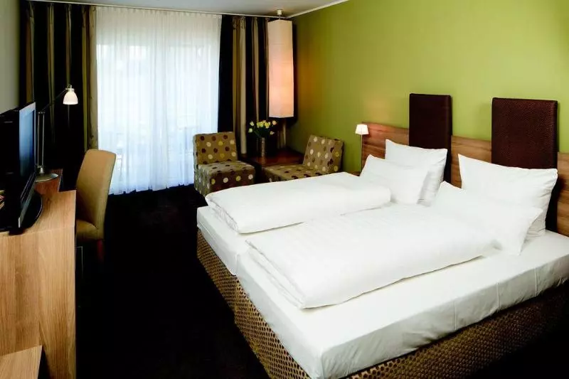 Отель Am Schlosspark Garni