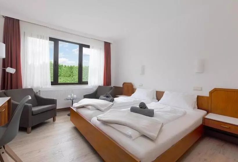 Отель Schomacker