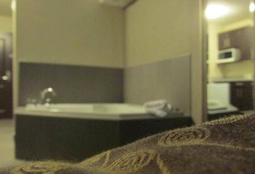 Отель Sigma Inn & Suites