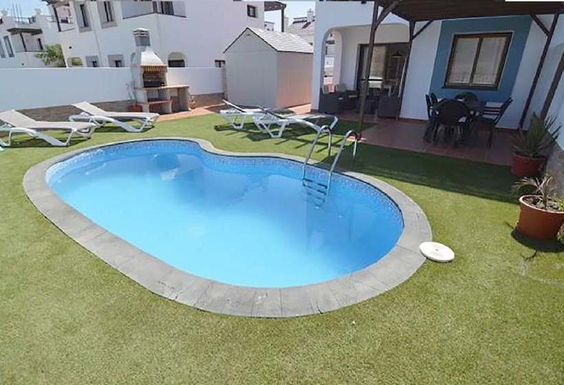 The Blue House With Mountain View