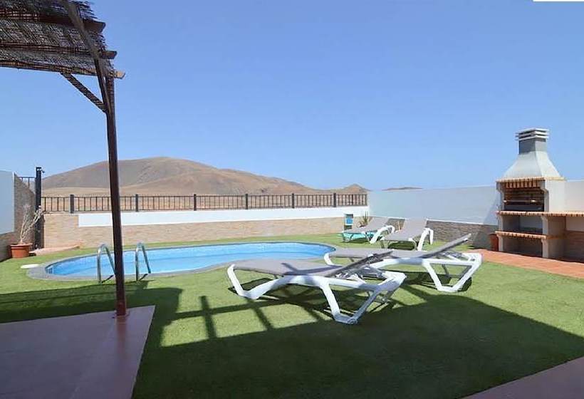 The Blue House With Mountain View