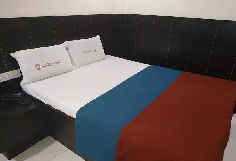 Iroomz Hotel Adhikar