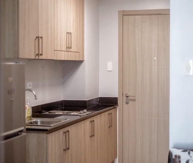 Usp Suites At Shore Residences