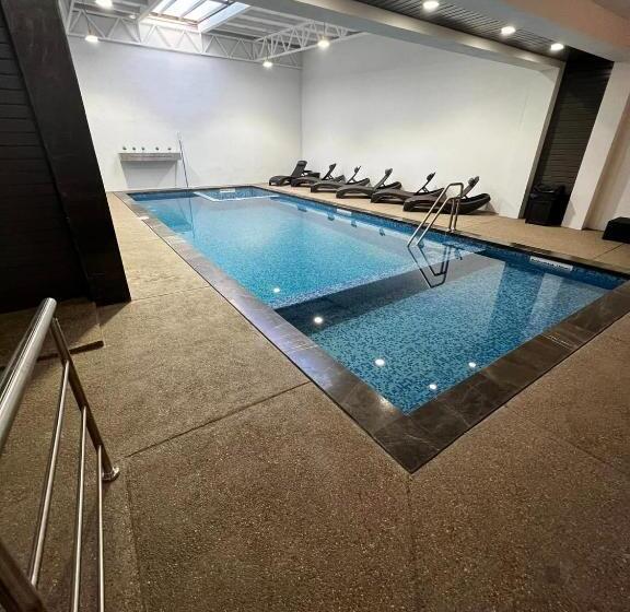 فندق Madison Suites