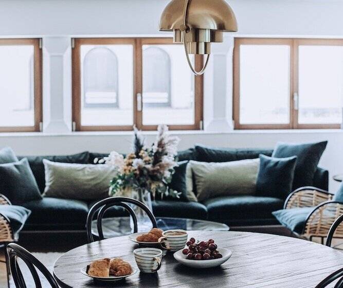 Отель Ocho Suites & Kitchen