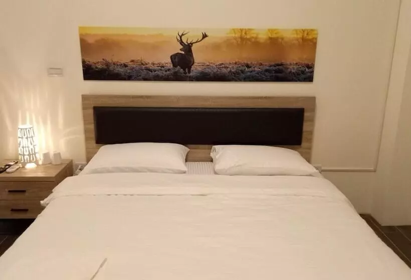 تختخواب و صبحانه Yuanshan Dahu Homestay