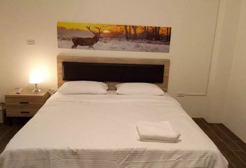 تختخواب و صبحانه Yuanshan Dahu Homestay