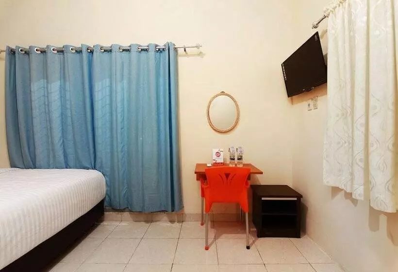 ホテル Oyo 1332 Almonsari Residence
