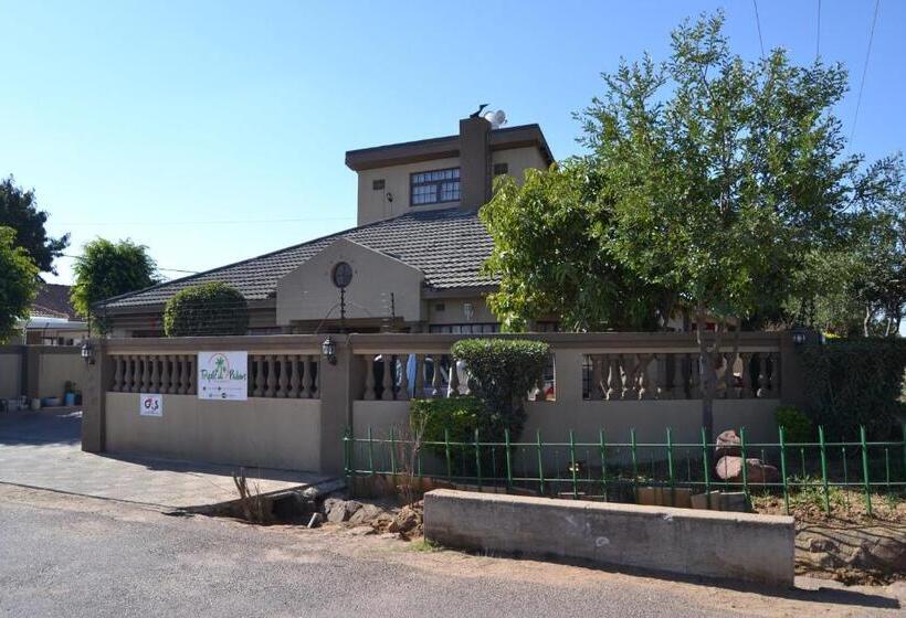 Triple Palms Bed And Breakfast