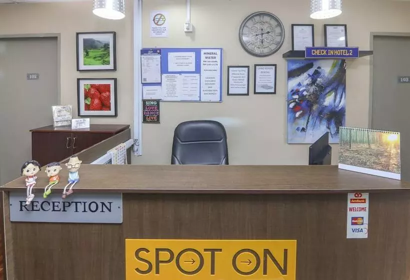 Spot On 89789 Hotel Check In 2