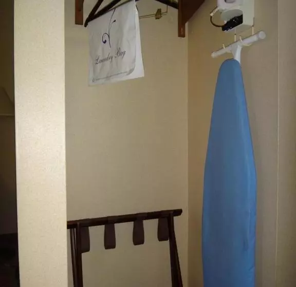 호텔 Windsor Inn & Suites