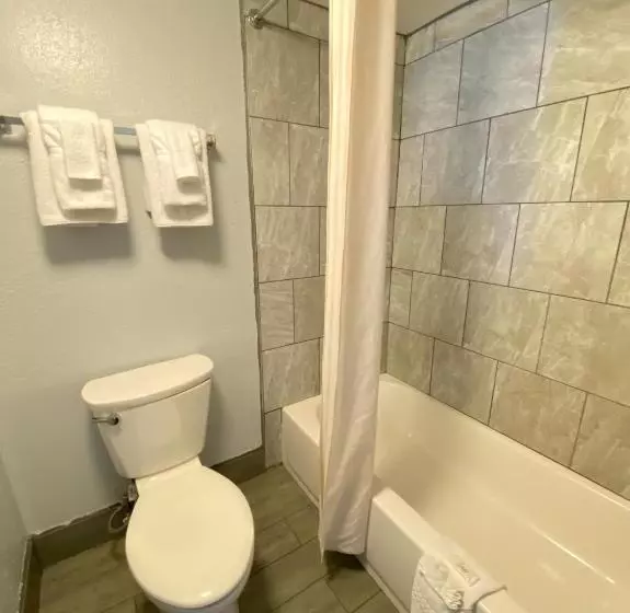 Отель Quarters Inn & Suites