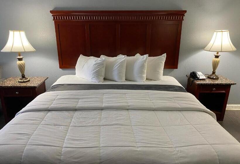 호텔 Quarters Inn & Suites