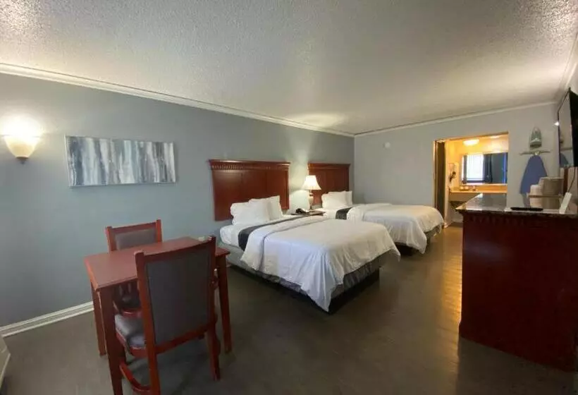 Отель Quarters Inn & Suites