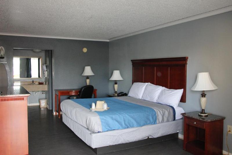 호텔 Quarters Inn & Suites