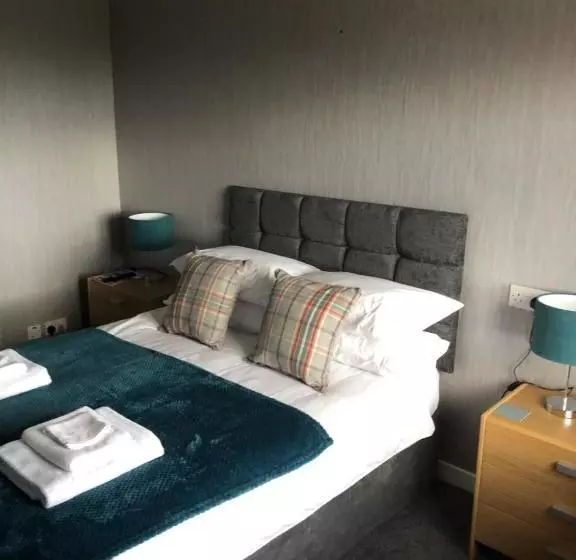 Отель Sinclair Bay Apartments