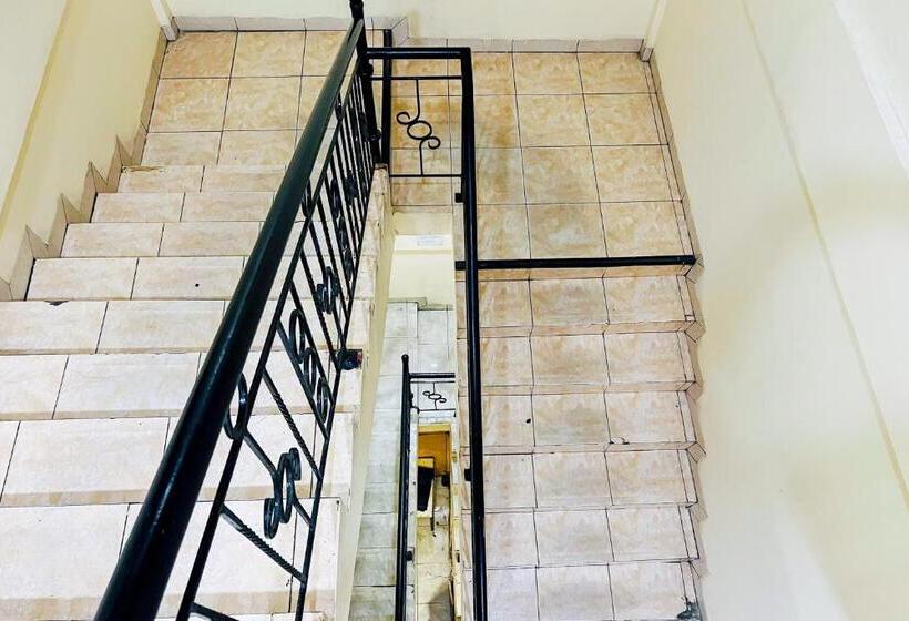 Отель Taisir Residence Near Palmerah Mitra Reddoorz