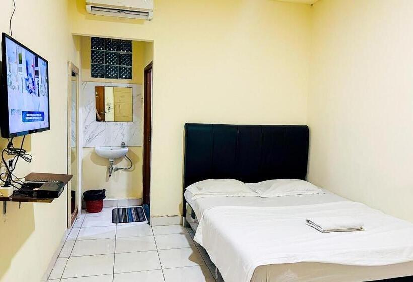 Отель Taisir Residence Near Palmerah Mitra Reddoorz