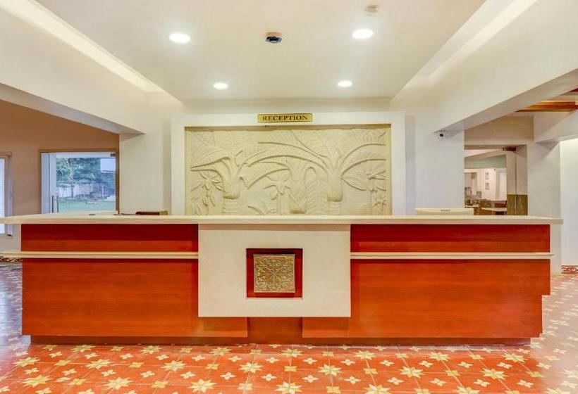 Отель Treebo Trend Palmyra Grand Suites