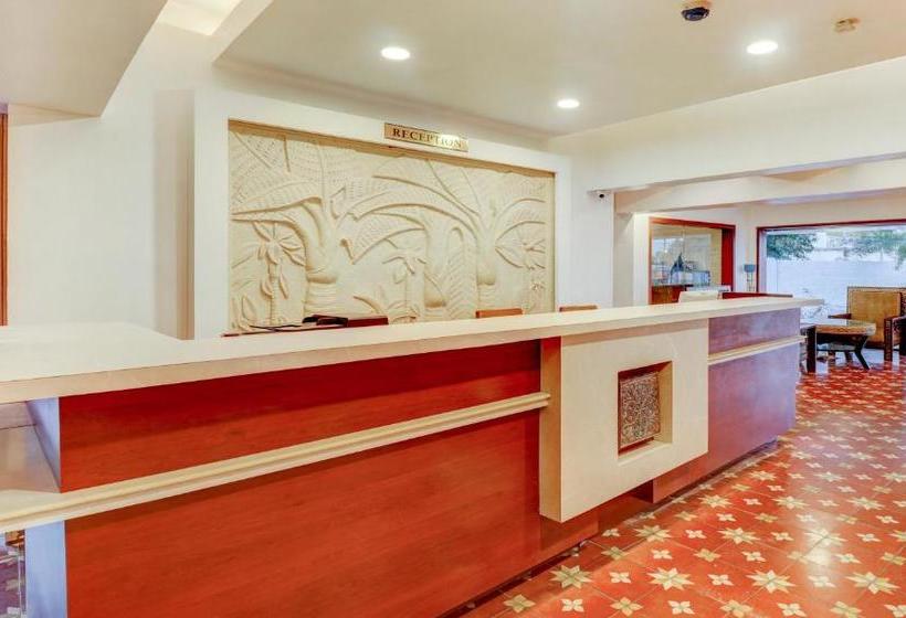 Отель Treebo Trend Palmyra Grand Suites