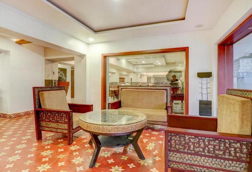 Отель Treebo Trend Palmyra Grand Suites