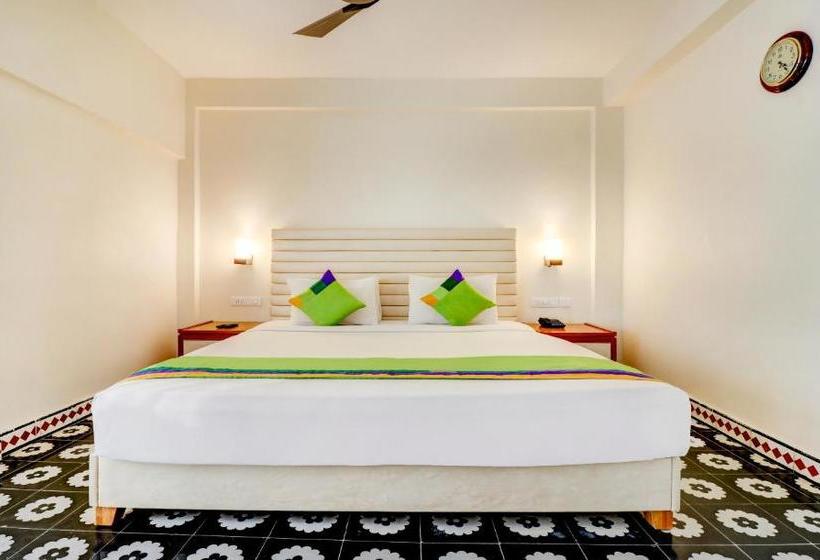 Отель Treebo Trend Palmyra Grand Suites