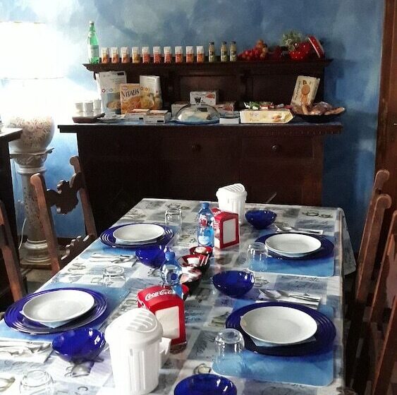 تختخواب و صبحانه Barone Rosso