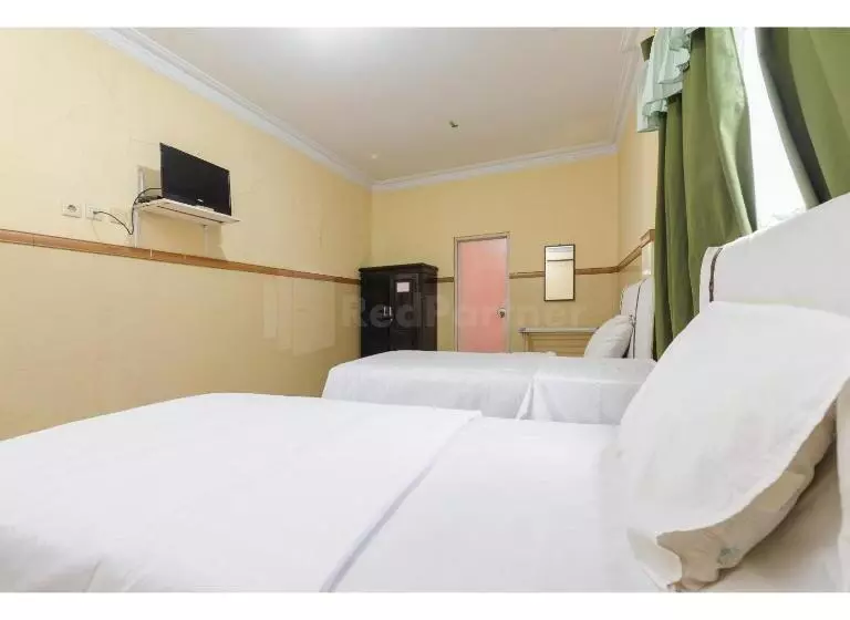 Hotel Al Hakim Syariah Redpartner