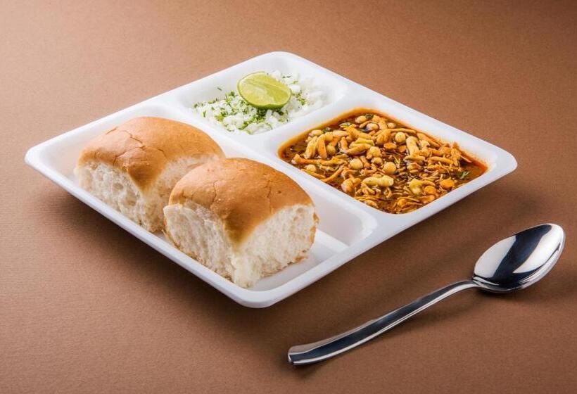 Fabhotel Paradise Inn   Nr Om Hospital