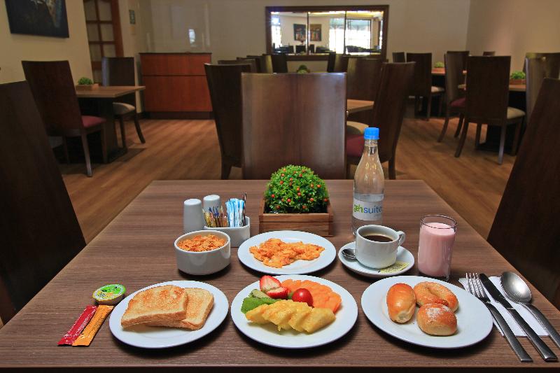 هتل Windsor House Inn By Geh Suites