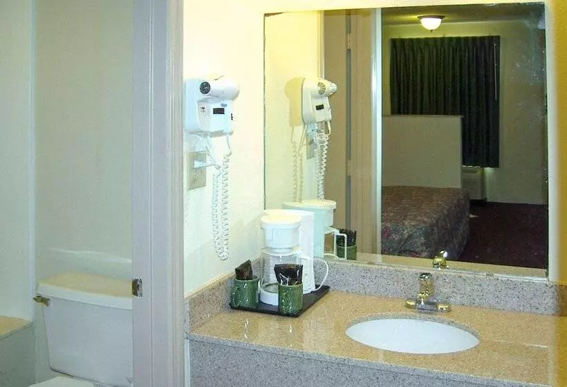 Отель Travelers Inn & Suites