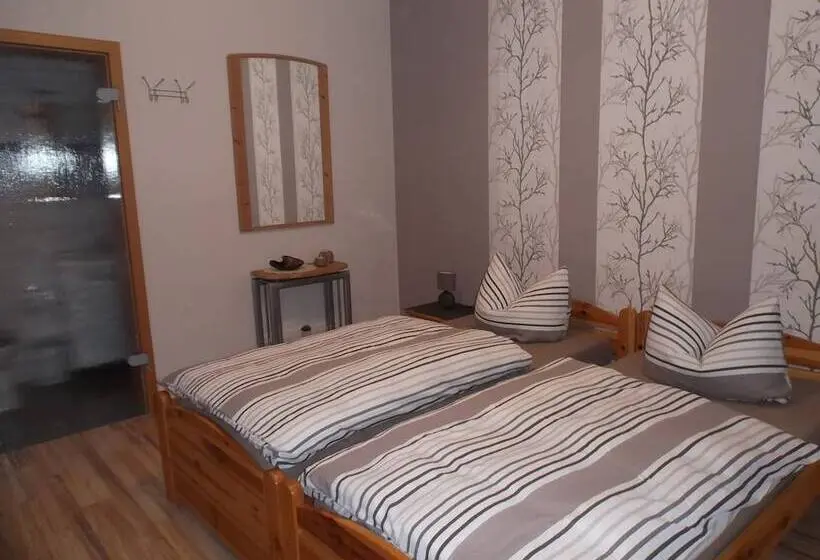 ホテル Ferienwohnung Schmitz