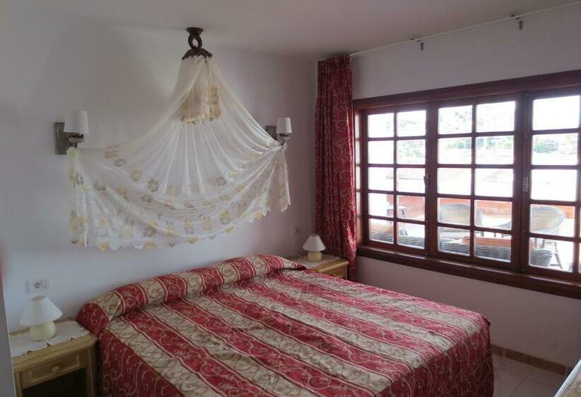 בית מלון כפרי Island Village