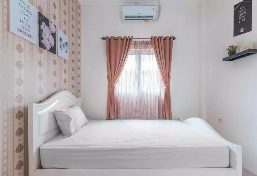 Hotelli Oyo Life 2658 Kost Rasyamada