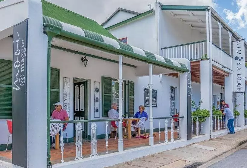 Отель Mimosa Lodge