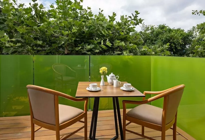 Отель Kyma Suites Beach