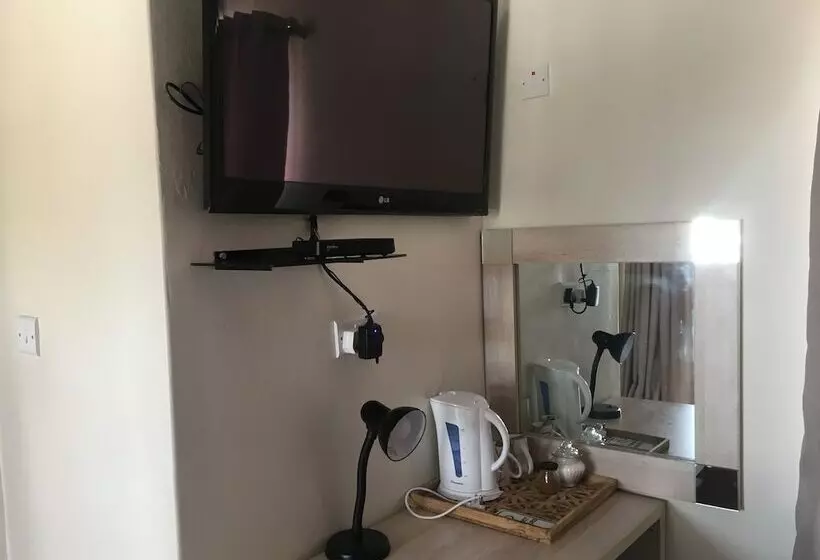 پانسیون Pleassure Suites