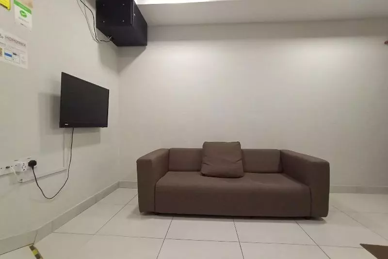 هتل Oyo 90261 Hom2rex Kuching Homestay