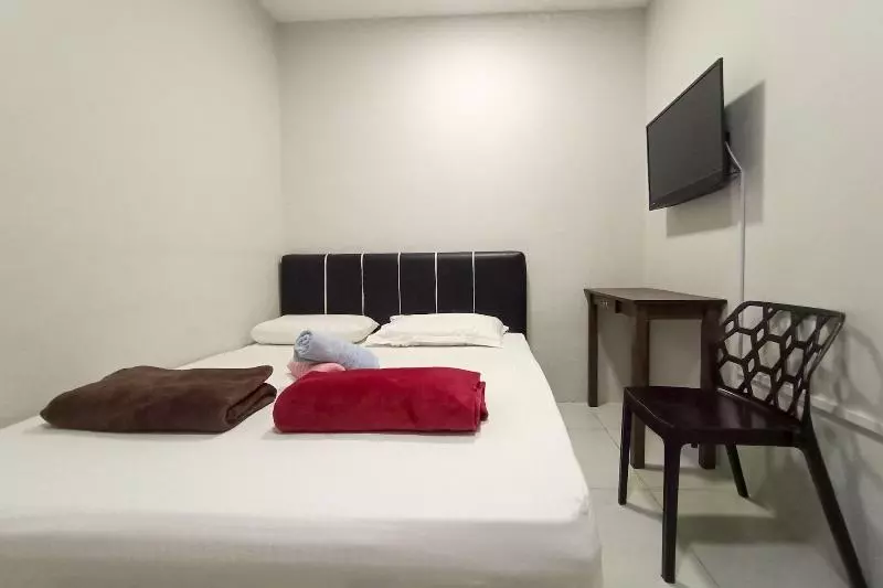 هتل Oyo 90261 Hom2rex Kuching Homestay