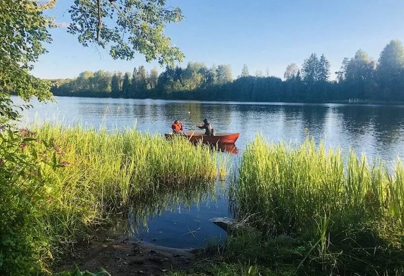 Tiny Hut In The Forest Overlooking The River