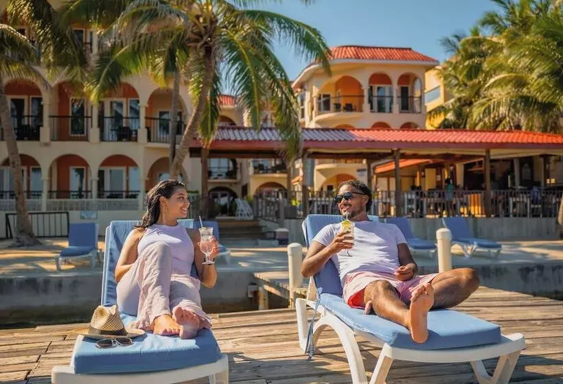 Отель Sunbreeze Suites