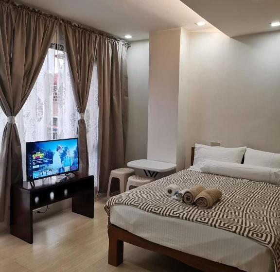 בית מלון כפרי Capital O 811 Tri A S Building