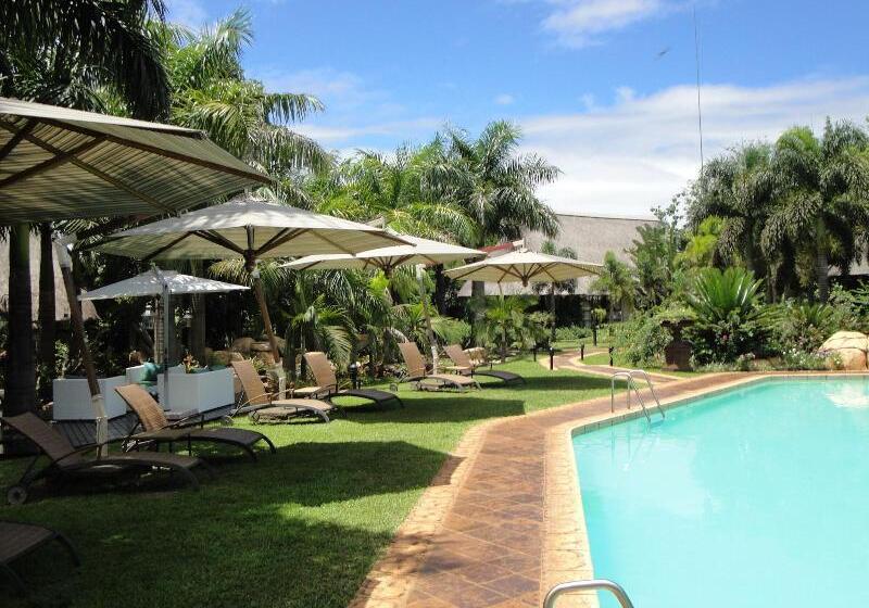 Отель Summerfield Luxury Resort & Botanical Garden