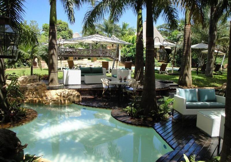 Отель Summerfield Luxury Resort & Botanical Garden