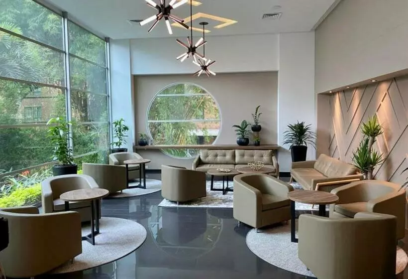 Отель Novelty Suites