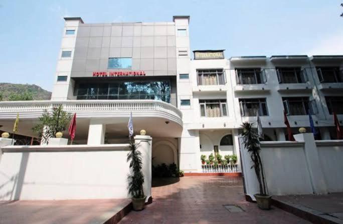 Отель International