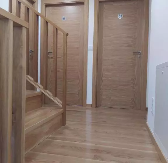 ペンション Huellas Albergue Turístico